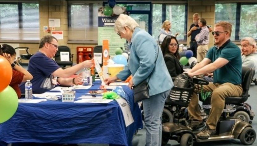 Visitors browse stalls at the MD Support Centre's open day